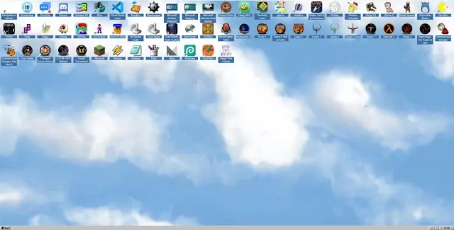 Escritorio de EmuOS mostrando la interfaz de Windows 98 con iconos de juegos clásicos